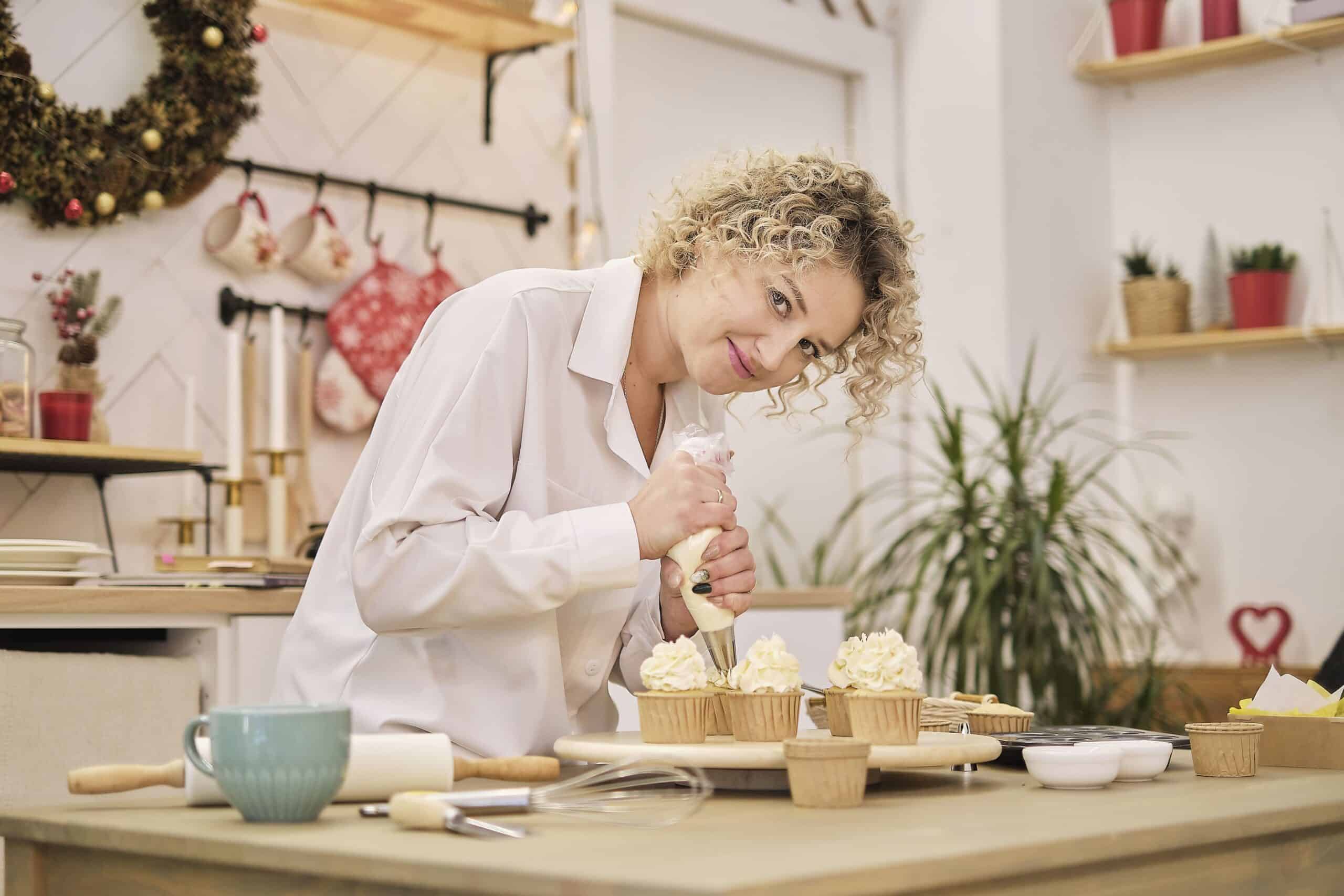 confectioner-squeezes-out-a-white-cream-in-the-for-2025-02-21-05-15-48-utc confectioner squeezes out a white cream in the for 2025 02 21 05 15 48 utc 1 scaled