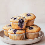 Greek yogurt blueberry muffins on ceramic plate