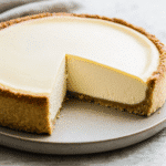 Healthy cheesecake recipe with almond flour crust on plate